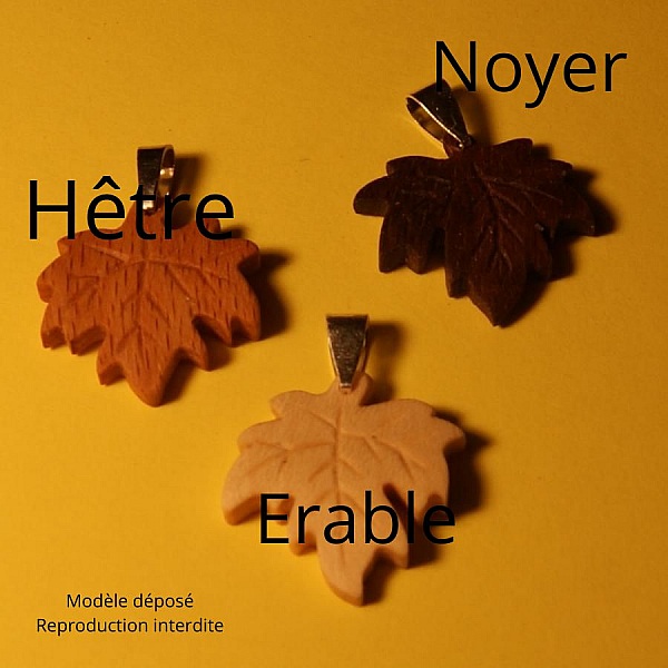 l&oslash;nneblad anheng laget av vokset riflet b&oslash;k etisk smykke, h&aring;ndlaget